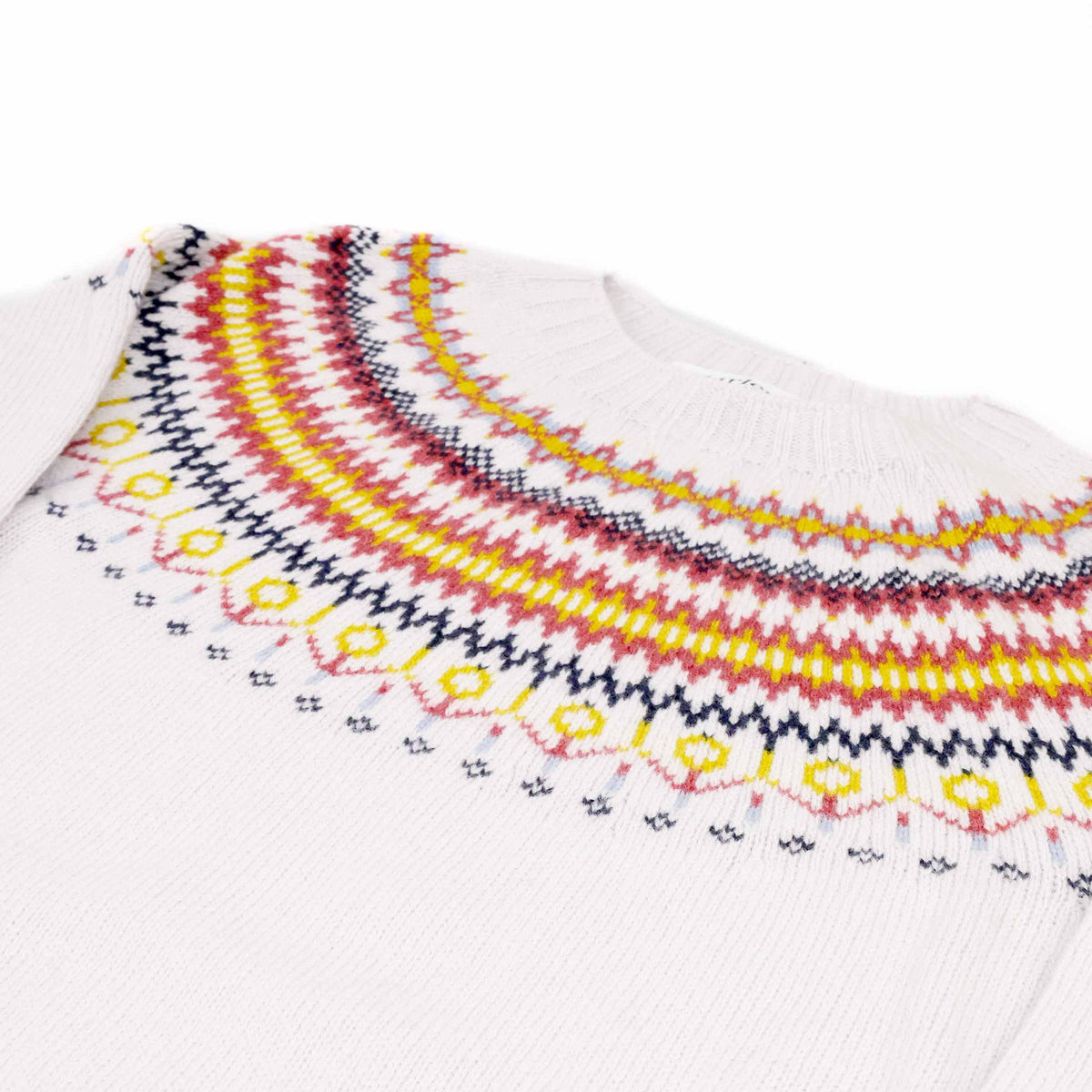 Harley of Scotland Women's Superfine " Fairisle " Sweater in Platinum — second view featuring a " Fairisle" pattern in red and orange on platinum white