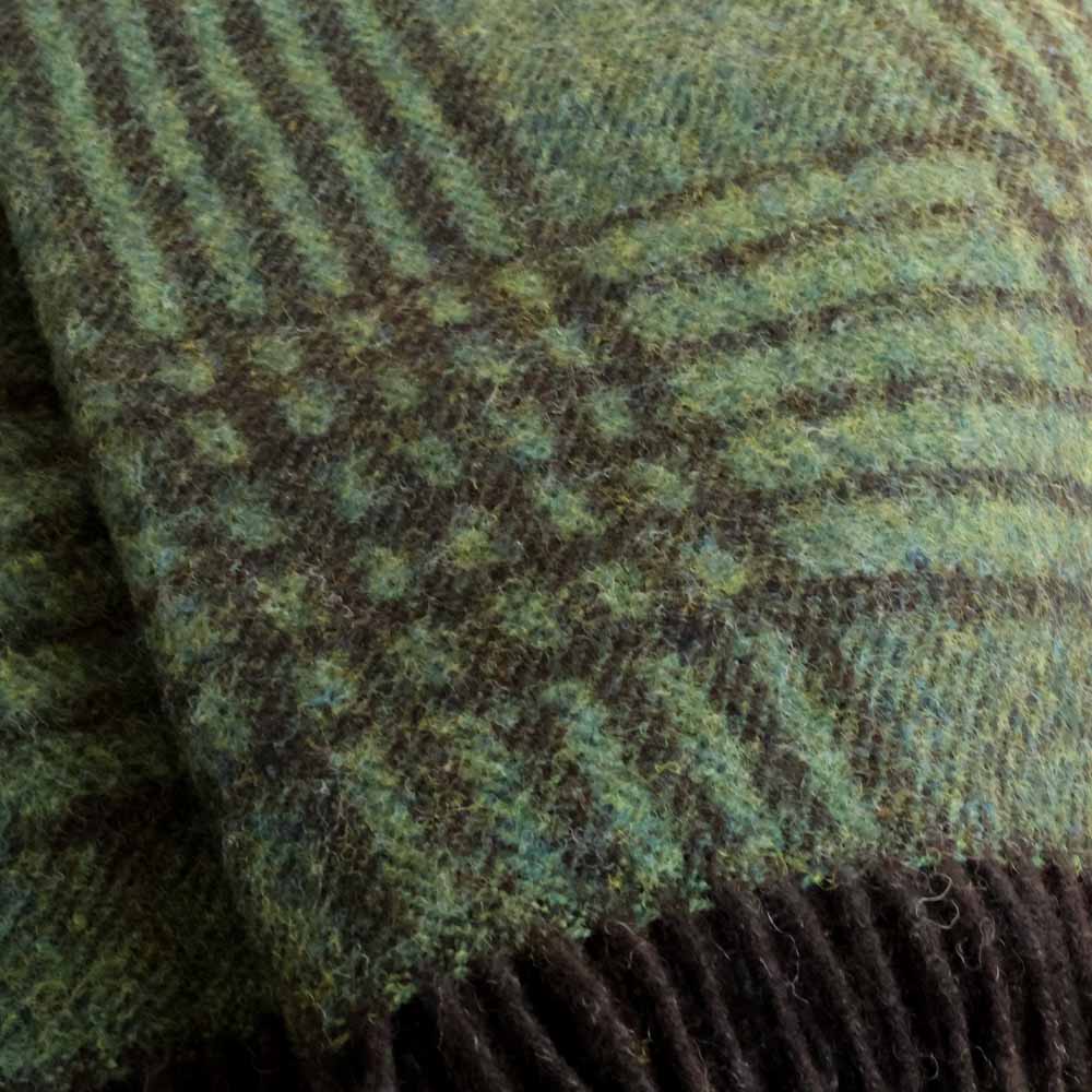 Shetland Wolldecke Grun Pfau Muster